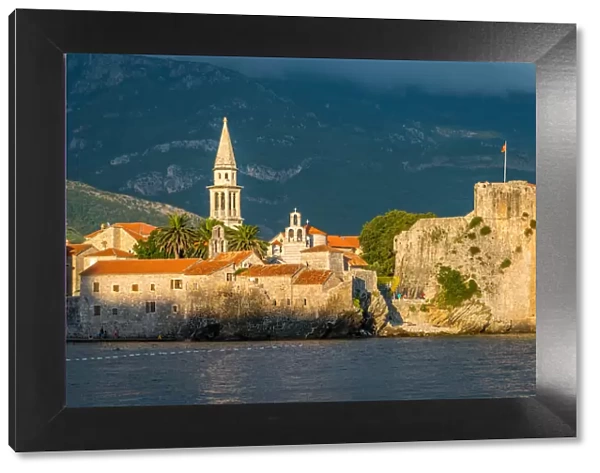 Budva, ancient walls and red tiled roof Montenegro
