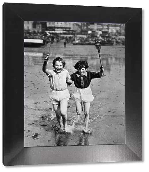 Southend. 26th April 1927: Children having fun on the beach at Southend