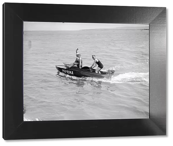 Speedboat. July 1929: An outboard motor boating party at Bournemouth