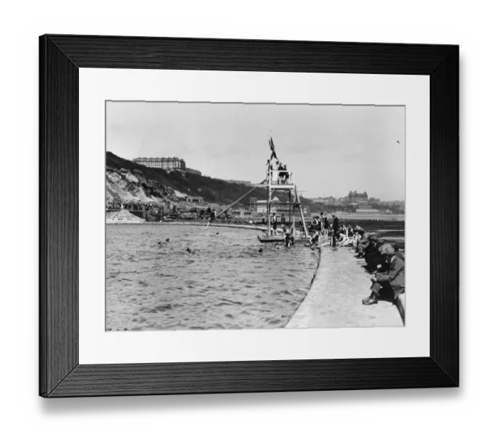 Framed Print : Divers. circa 1917: The diving board at the bathing pool at the South Cliff Framed Print : Divers. circa 1917: The diving board at the bathing pool at the South Cliff