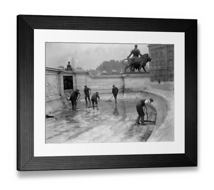 Framed Print : Scrub Out. May 1927: Workmen cleaning the basin of the Queen Victoria monument Framed Print : Scrub Out. May 1927: Workmen cleaning the basin of the Queen Victoria monument