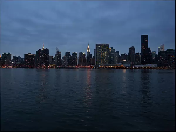 View of East River and midtown Manhattan at night