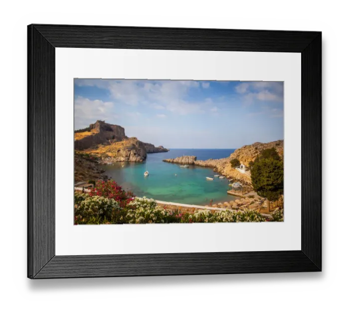 Framed Print : Lindos. Acropolis overlooking turquoise waters of Lindos Bay near the town