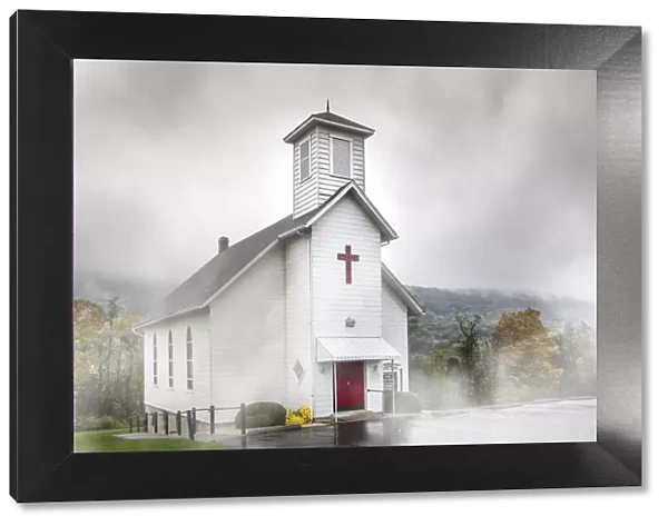 White church in the misty mountains