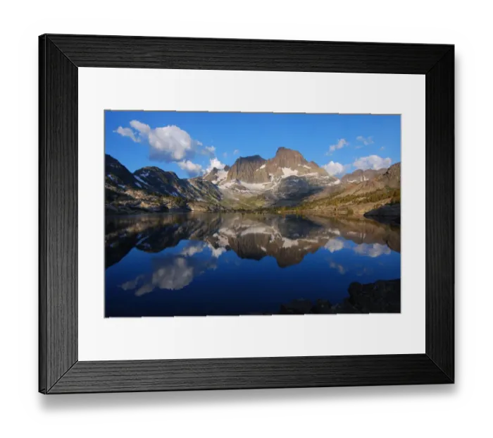 Framed Print : Mirror-like reflections of mighty peaks in an alpine lake Framed Print : Mirror-like reflections of mighty peaks in an alpine lake