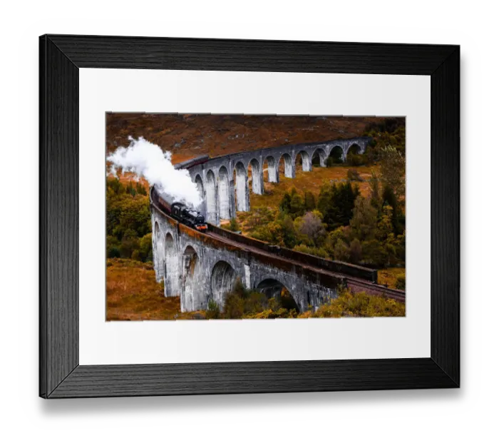 Framed Print : Steam train crossing the Glenfinnan bridge with autumn colors in Scotland Framed Print : Steam train crossing the Glenfinnan bridge with autumn colors in Scotland