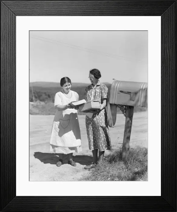 Framed Print : Two women collect mail from country mailbox Framed Print : Two women collect mail from country mailbox