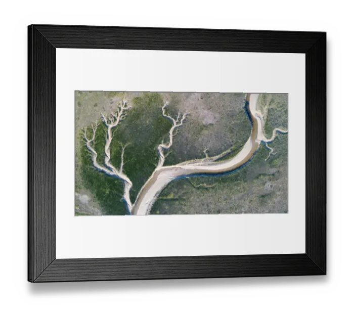 Framed Print : Coastal wetland environment on Schiermonnikoog island, with tidal channels, seen Framed Print : Coastal wetland environment on Schiermonnikoog island, with tidal channels, seen