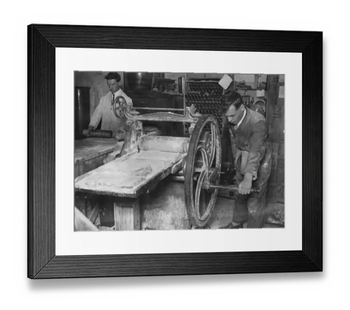 Framed Print : Rat Wars. 10th October 1928: Men rolling poison dough Framed Print : Rat Wars. 10th October 1928: Men rolling poison dough