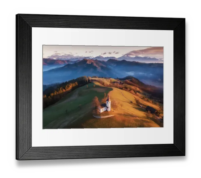 Framed Print : Beautiful Sunrise Landscape Of Saint Thomas Church and Julian Alps In Slovenia Framed Print : Beautiful Sunrise Landscape Of Saint Thomas Church and Julian Alps In Slovenia