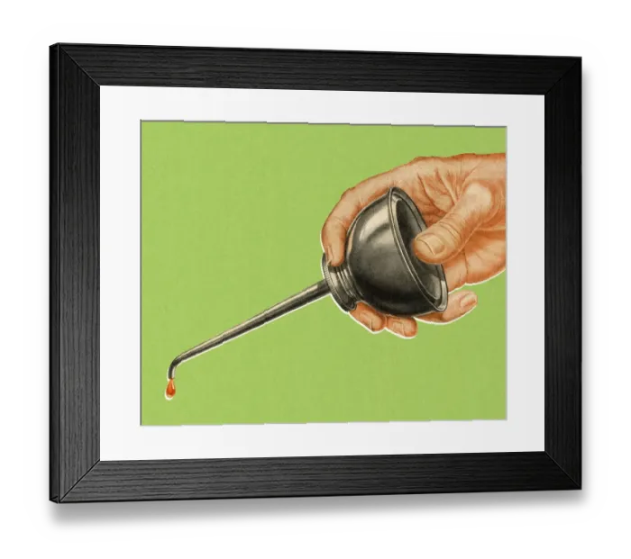 Framed Print : Hand Using an Oil Can Framed Print : Hand Using an Oil Can