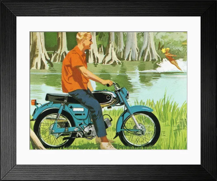 Framed Print : Man Riding a Motorcycle by a Lake Framed Print : Man Riding a Motorcycle by a Lake