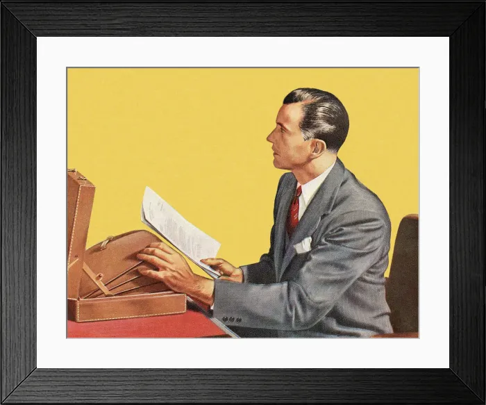 Framed Print : Man Holding Papers Framed Print : Man Holding Papers
