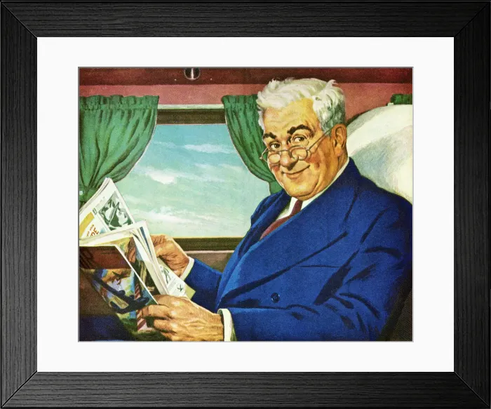 Framed Print : Man Reading Magazine on Train