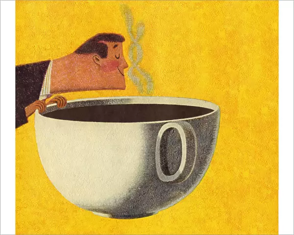 Man Smelling Giant Cup of Coffee