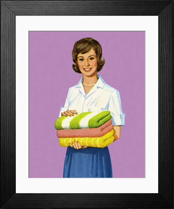 Framed Print : Woman Holding Folded Towels Framed Print : Woman Holding Folded Towels