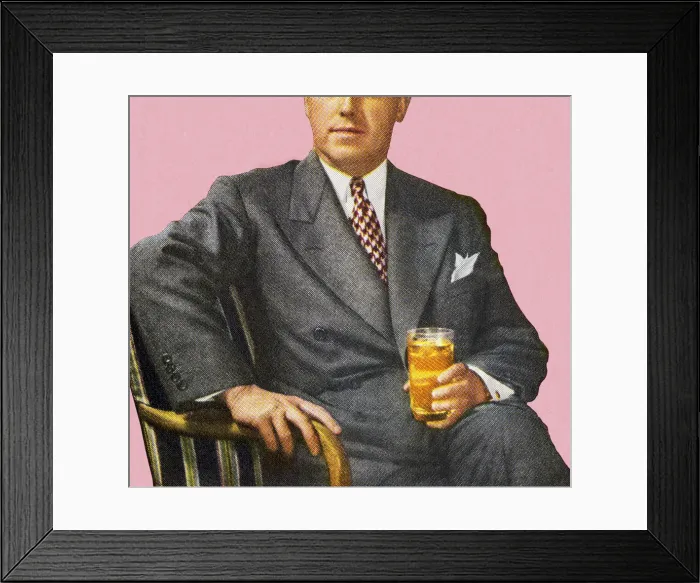 Framed Print : Man Sitting Holding Drink Framed Print : Man Sitting Holding Drink