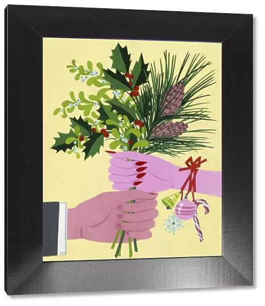 Man and Woman Holding Christmas Bouquet