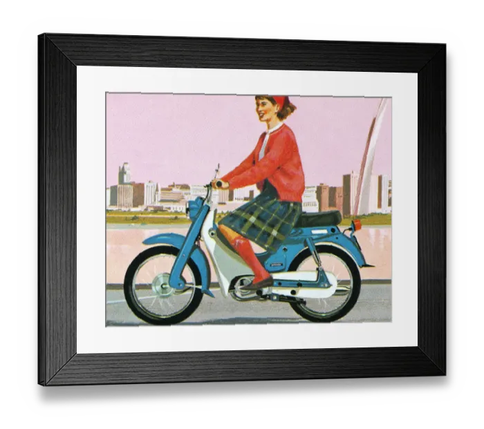 Framed Print : Woman Riding a Motorcycle in the City Framed Print : Woman Riding a Motorcycle in the City