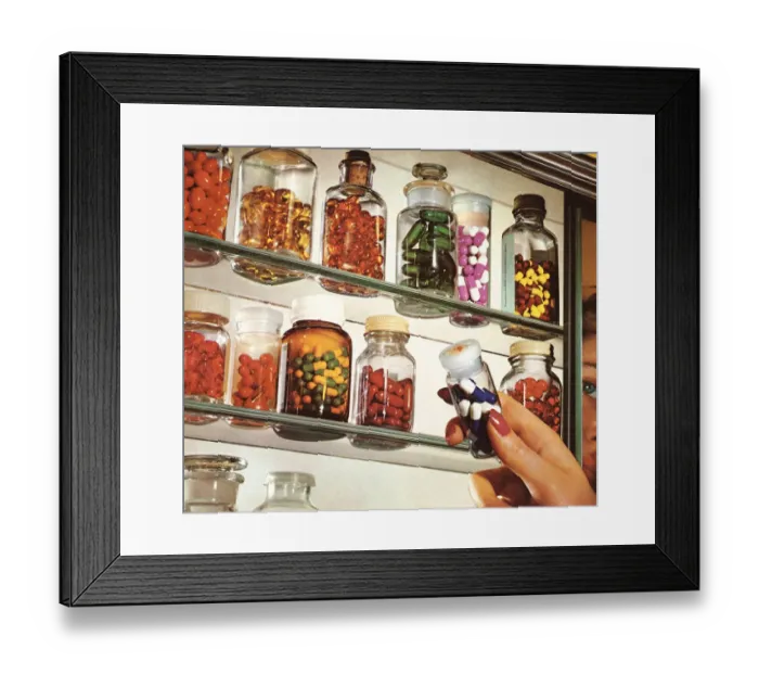 Framed Print : Womans Hand in Medicine Cabinet Framed Print : Womans Hand in Medicine Cabinet