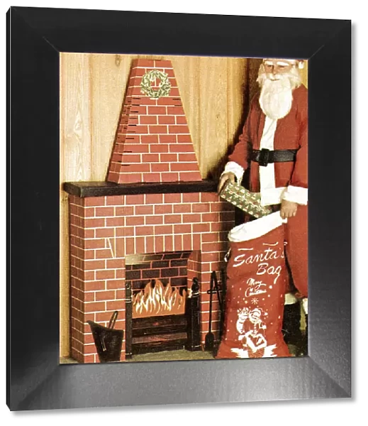 Santa with Gifts Outside a Paper Chimney
