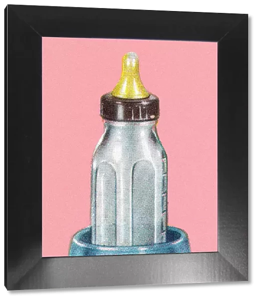 Baby Bottle on Pink Background