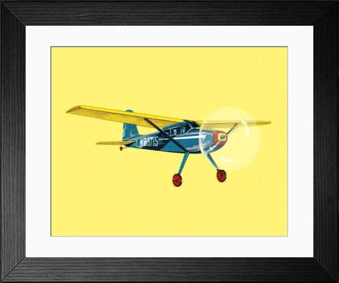 Framed Print : Small Airplane on a Yellow Background Framed Print : Small Airplane on a Yellow Background