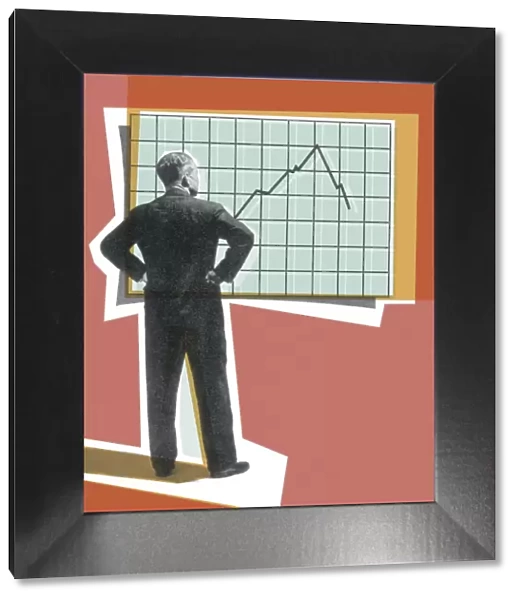 Businessman Looking at a Graph