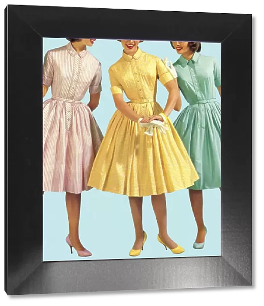 Three Woman Wearing Pastel Colored Dresses