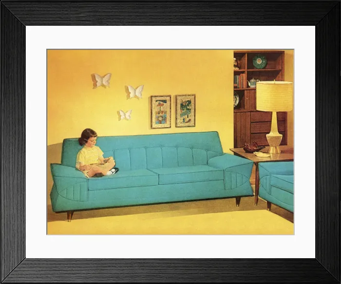 Framed Print : Girl Reading On Turquoise Couch