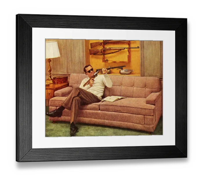 Framed Print : Man Wearing Sunglasses and Holding Gun Framed Print : Man Wearing Sunglasses and Holding Gun