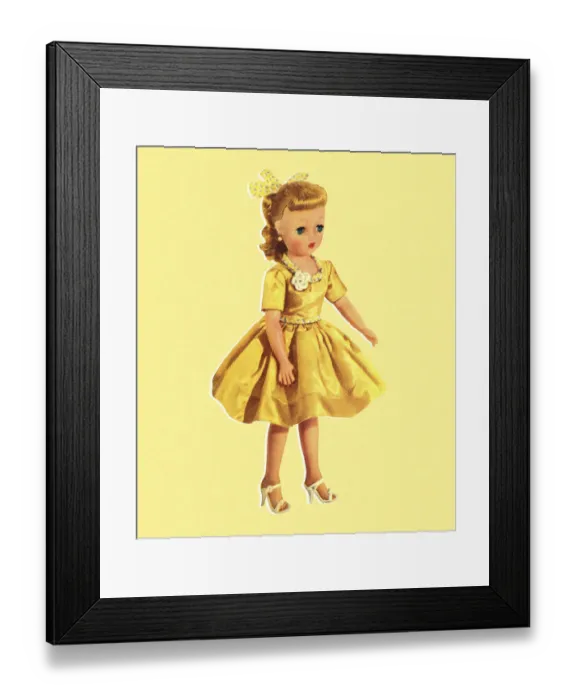 Framed Print : Doll Wearing Yellow Dress