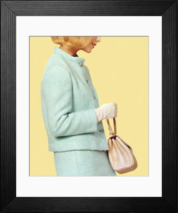 Framed Print : A woman in vintage blue suit holding a purse Framed Print : A woman in vintage blue suit holding a purse