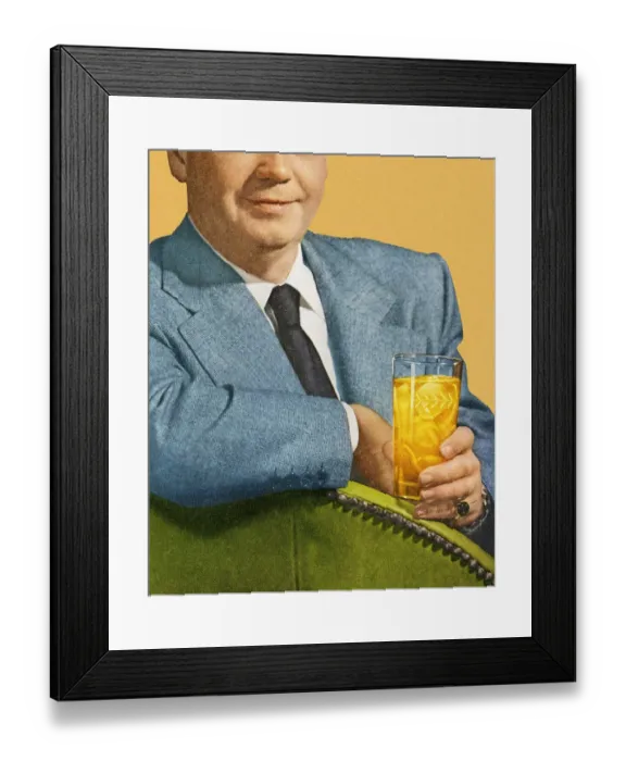 Framed Print : Man Sitting and Holding Drink Framed Print : Man Sitting and Holding Drink