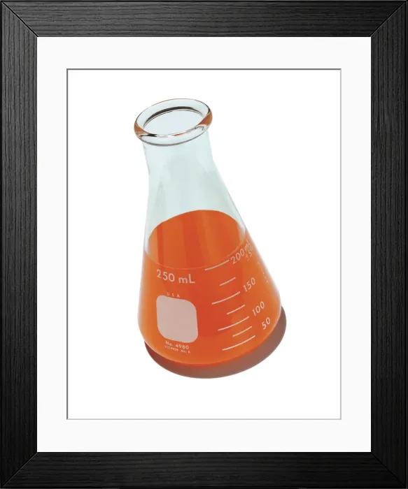 Framed Print : Laboratory Container With Orange Liquid Framed Print : Laboratory Container With Orange Liquid