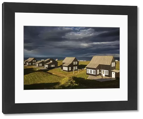 Cottages, cottage settlement in Hellnar, cloud formation, peninsula Snaefellsnes, West Iceland
