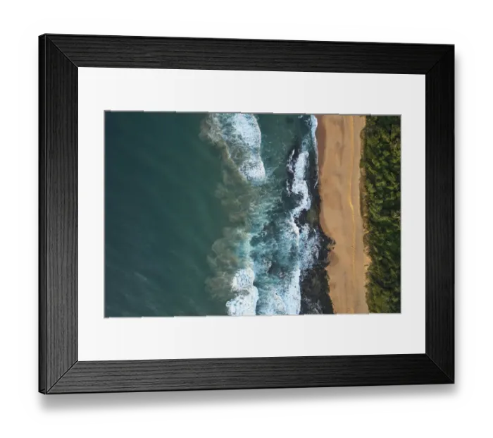 Framed Print : Quiet coastline beach with no people. There is a great flow of contrast between the ocean