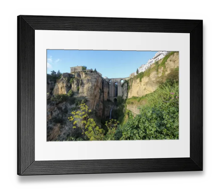 Framed Print : The Puente Nuevo bridge in Ronda, spanning the deep canyon of the Guadalevin River Framed Print : The Puente Nuevo bridge in Ronda, spanning the deep canyon of the Guadalevin River