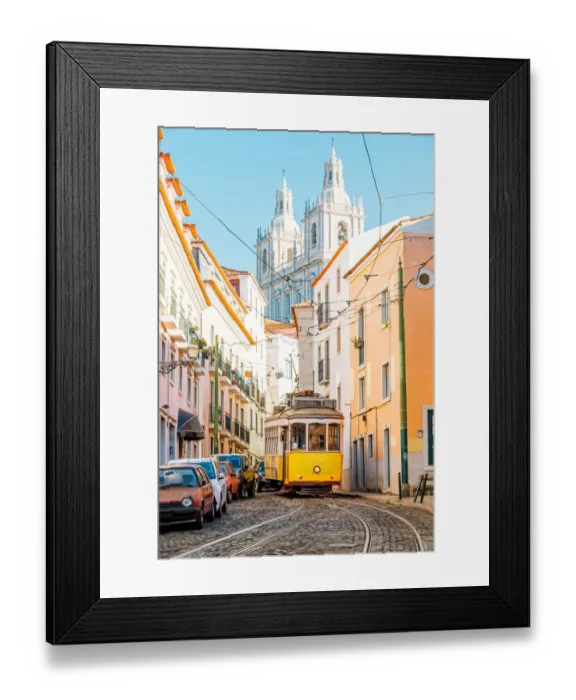 Framed Print : Yellow tram on the narrow street of Alfama district in Lisbon, Portugal Framed Print : Yellow tram on the narrow street of Alfama district in Lisbon, Portugal