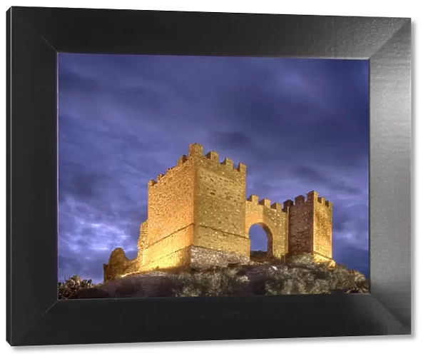 Ruins illuminated at dusk of the Castillo de Tabernas, AlmerAia