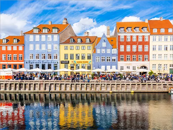 Multicolored houses along the canal in Nyhavn harbor, Copenhagen, Denmark