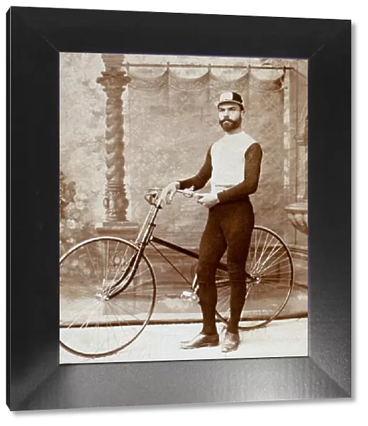 Man Posing with Bicycle