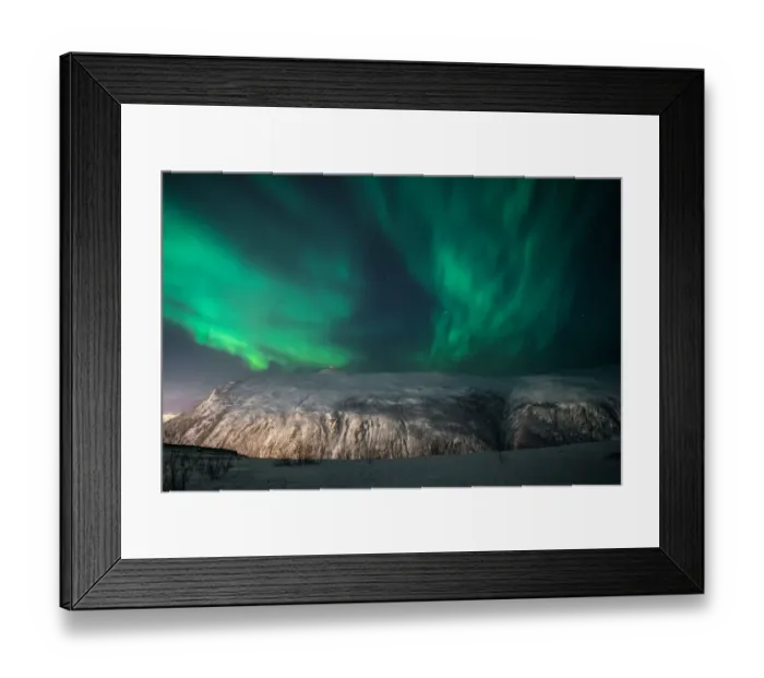 Framed Print : Aurora Borealis on a starry night behind a mountain, Tromso, Norway Framed Print : Aurora Borealis on a starry night behind a mountain, Tromso, Norway
