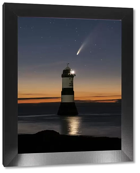 Comet NEOWISE and the Night Sky above Trwyn Du Lighthouse or Penmon Point Lighthouse