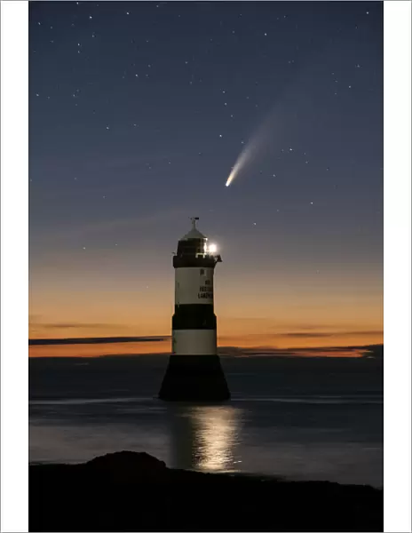 Comet NEOWISE and the Night Sky above Trwyn Du Lighthouse or Penmon Point Lighthouse