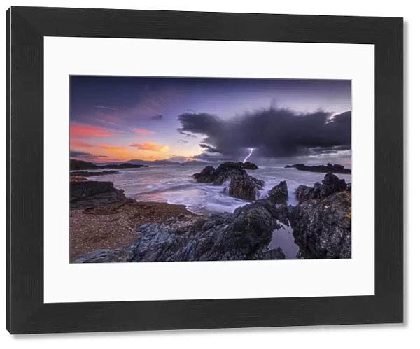 Llanddwyn Island beach at sunset with a lightning strike, Bangor, Caernarfon, , Anglesey
