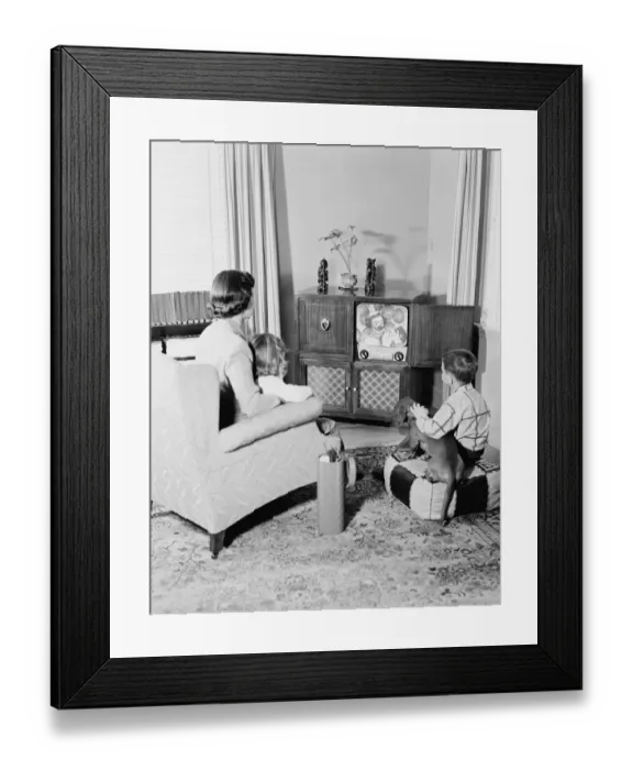 Framed Print : Mother and children watching television Framed Print : Mother and children watching television