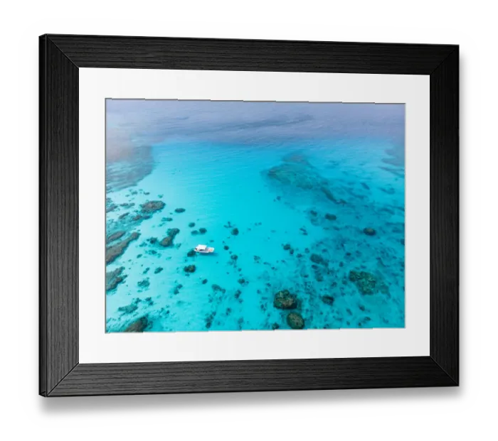 Framed Print : Kerama Islands National Park with clear tropical water and boat from above, Okinawa Framed Print : Kerama Islands National Park with clear tropical water and boat from above, Okinawa