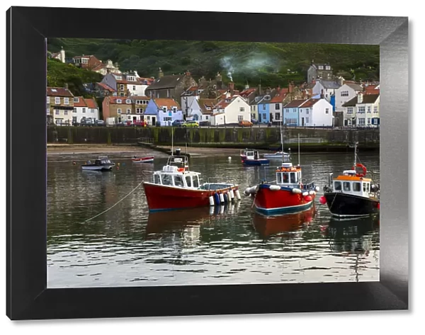 Boats in the harbour at Staithes, North Yorkshire, England