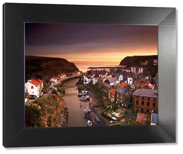 Cityscape at sunset, Staithes, Yorkshire, England